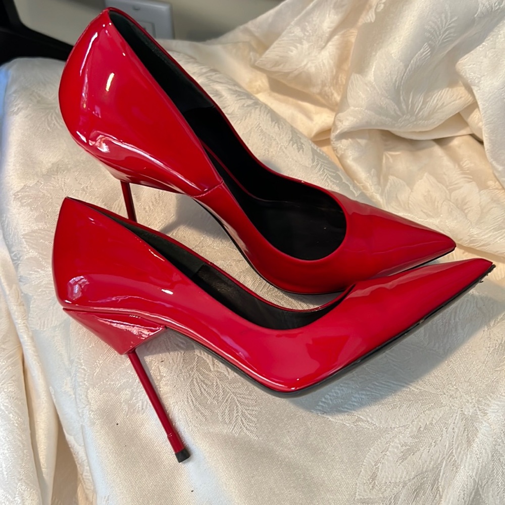 Designer red pan leather shoes. Size 7, 4 inch heel. Made in London.